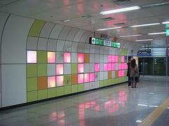 Ewha Womans University Station entrance with modern architecture and signage