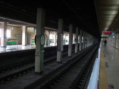 Hanyang University Subway Station platform with tracks and overhead structures
