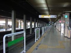 Interior of Hanyang University Subway Station with escalators and passengers