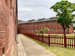 Seodaemun Prison historical building with brick walls and barred windows in April 2023