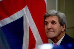 U.S. Secretary of State John Kerry listens to Sir Bob Reid at Benjamin Franklin House in London