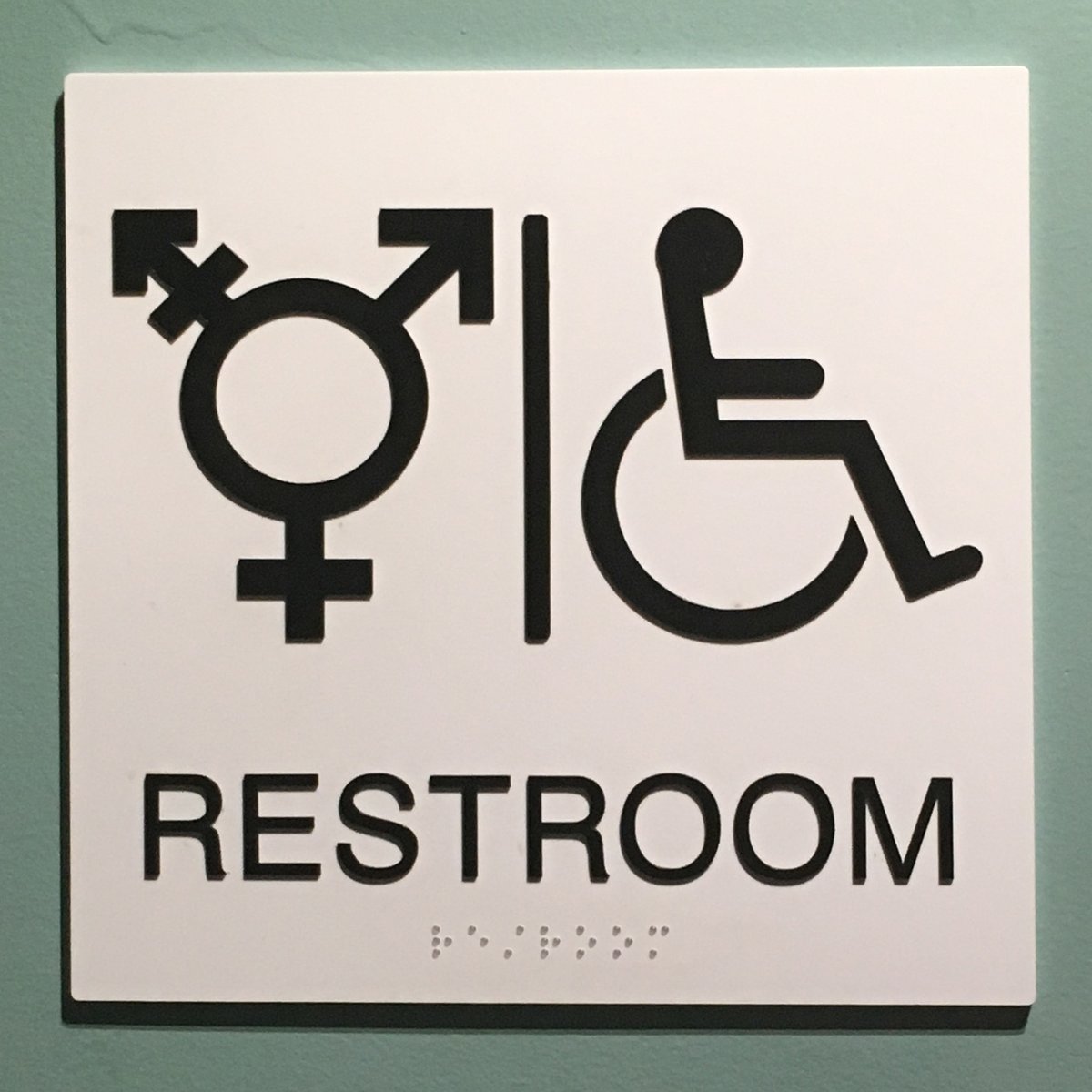 All gender restroom sign at San Diego Natural History Museum
