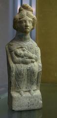 Gallo-Roman mother goddess figurine breastfeeding child, terracotta, found in Reims