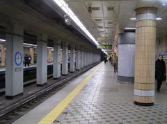 Miasamgeori Station platform with stairs, signs, and railway tracks of Seoul Subway Line 4