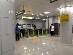 Ticket barrier at Sinseol-dong Station showing access gates for Seoul Subway Line 1, Line 2 and Ui LRT