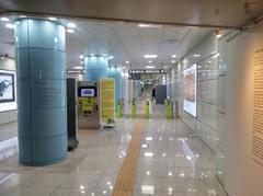 Interior view of Sinseol-dong Station transfer passage connecting Seoul Subway Line 1, Line 2, and Ui LRT