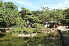 Pond at Jongmyo Shrine in Seoul with traditional Korean architecture