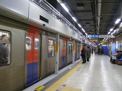 Dongdaemun Station entrance with signage and people