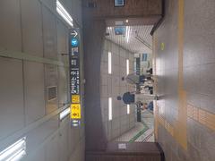 Sadang Station transfer passage interior with escalators and bright lighting