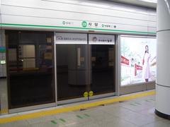 Sadang Station platform with train and passengers