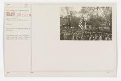 University of Pennsylvania students being inducted into the Students' Army Training Corps with U.S. Marines raising a flag