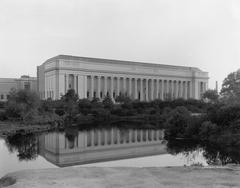 The Museum of Fine Arts reflected in the Muddy River in the Back Bay Fens during the 1910s
