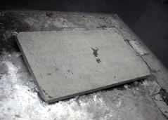 Memorial stone with Latin inscription honoring those buried at Black Friars’ Cloister in Stockholm, Sweden