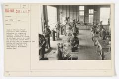 Storage battery department with workers rebuilding storage batteries at University of Texas Army Training Detachment Austin