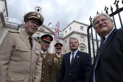 Chairman of the Joint Chiefs of Staff Adm. Mike Mullen and British Chief of Defense Staff Gen. Sir David Richards posing with U.S. Congressman Mike McIntyre and Kenny Marchant in St. James Park London 2011