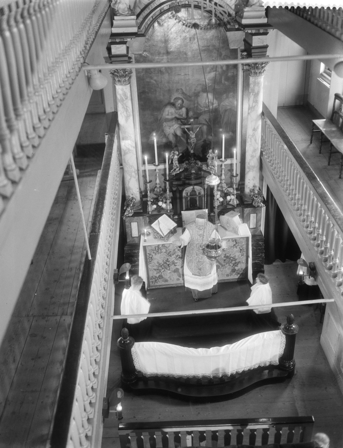 Black and white photograph of the 75th anniversary celebration of the Amstelkring in Amsterdam, taken on January 9, 1959