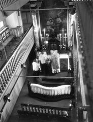 Bishop J. P. Huibers celebrating high mass at the 75th anniversary of the Amstelkring in Amsterdam on January 9, 1959, black and white photo