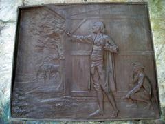 Relief sculpture at the base of the Benjamin Franklin statue at Old City Hall in Boston
