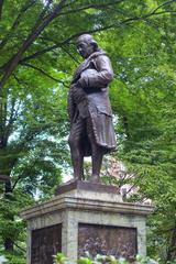 statue of Benjamin Franklin in front of Old City Hall Boston