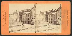 Statue of Benjamin Franklin covered in snow during winter