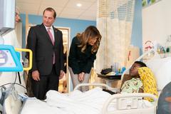 First Lady Melania Trump greeting patients at Boston Medical Center pediatric wing with Secretary Alex Azar and hospital staff