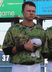 U.S. Marine Corps Color Guard presenting colors at Marine Night opening ceremony at Harbor Park Stadium