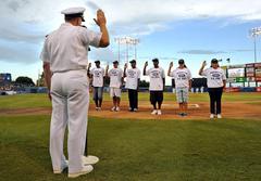 Delayed entry program enrollees reciting oath of enlistment at Norfolk Tides Navy Day celebration at Harbor Park