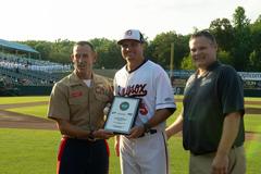 Col. J. P. McDonough throwing ceremonial first pitch at Bowie Baysox Navy Night