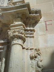 Close-up view of an ancient stone capitell at the Monastery of Santa Faç in Alicante
