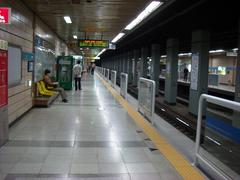 Sinyongsan Station exterior with stairs and modern architecture