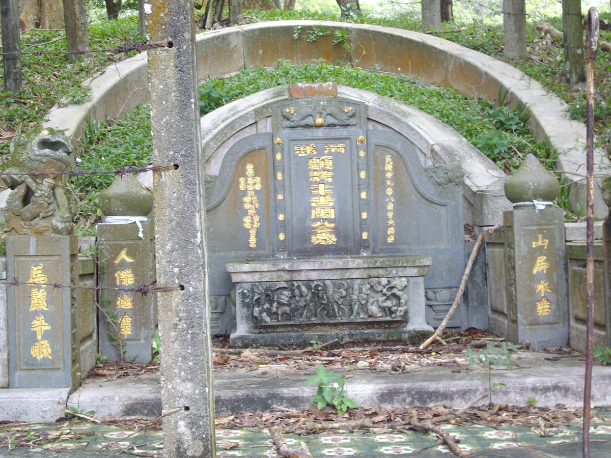 Ancient Chinese graveyard on China Hill in Melaka with traditional tombstones
