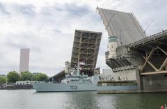 HMCS Edmonton naval ship passing through the Burnside Bridge on the Willamette River during Portland Rose Festival Fleet Week 2018