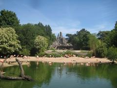 Hagenbeck Zoo Entrance with Palm Trees and Visitors