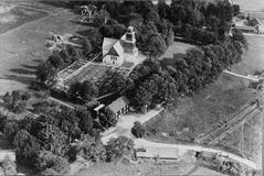 Aerial view of Nydala Abbey ruins surrounded by greenery