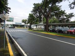 Armed Forces of the Philippines Museum building at Camp Aguinaldo in Quezon City with the St. Ignatius Cathedral