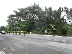 Camp Aguinaldo AFP Museum and Multi-Purpose Theater facade in Quezon City with flags and landscaping