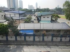Santolan–Annapolis MRT Station exterior with nearby EDSA highway and Camp Crame in Quezon City, Philippines