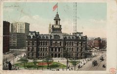 Historic City Hall and Campus Martius buildings under clear sky