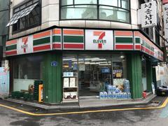 Street with stores and buildings in an unidentified place in South Korea