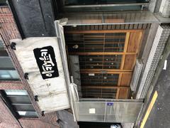 Street view of unidentified places in South Korea with shops and buildings