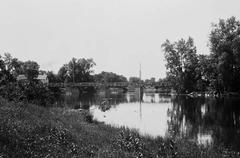 Old Billings Bridge over the Rideau River with surrounding autumn foliage