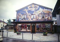 Bavaria Oberammergau village square with crucifixion mural on building facade