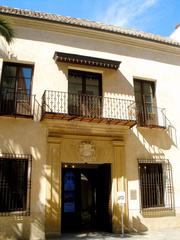 Exterior view of Museo Carmen Thyssen Málaga with modern architecture and bright facade