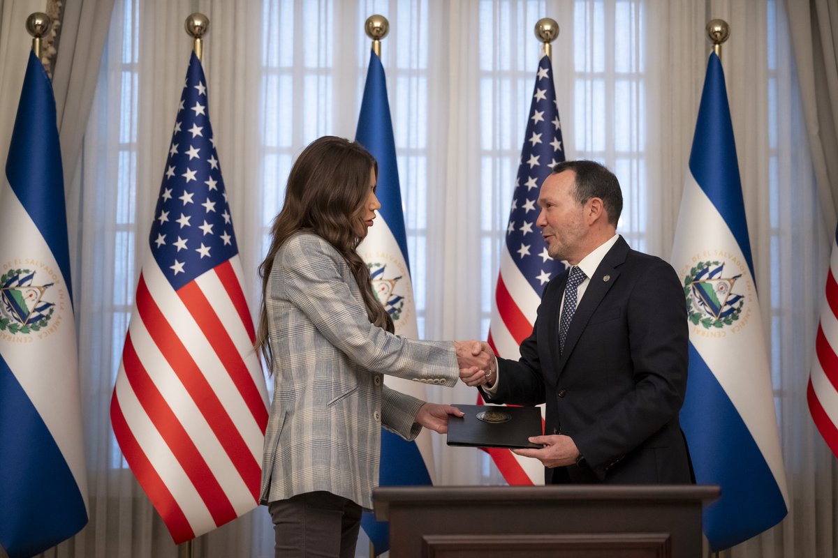 DHS Secretary Kristi Noem signing security alliance memorandum with El Salvador's Minister of Justice Gustavo Villatoro at Casa Presidencial
