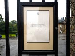 Official death notice of Queen Elizabeth II posted on the gates of the Palace of Holyroodhouse in Edinburgh, Scotland