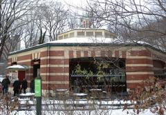 Central Park Carousel covered in snow on a cloudy afternoon
