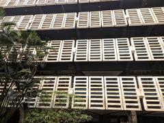Modern architecture building with glass facade and geometric design