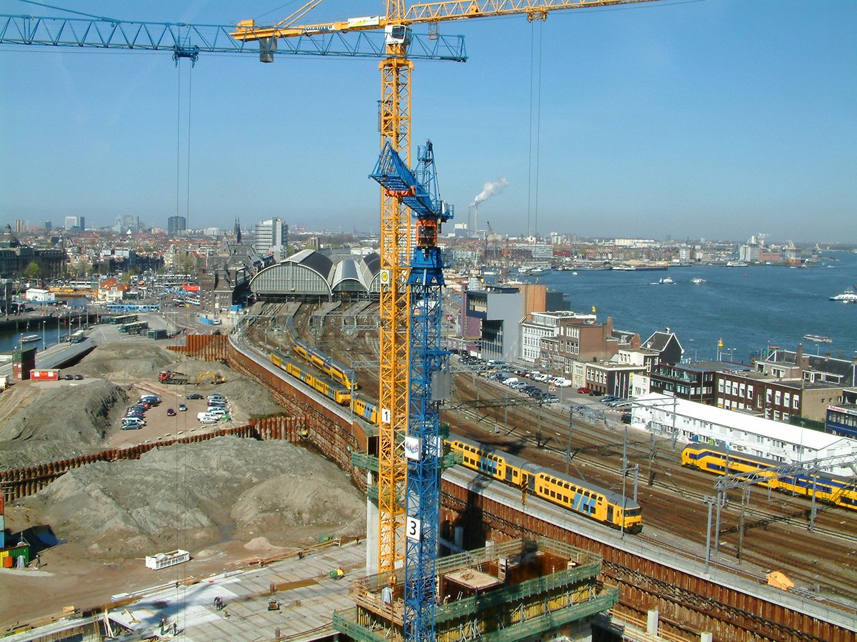Overview of a large building pit with cranes at Oosterdokseiland near Amsterdam Central Station, spring 2005
