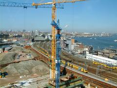 Overview of a large building pit with cranes at Oosterdokseiland near Amsterdam Central Station, spring 2005
