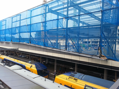 Rebuilding activities with a huge blue mobile fence at Utrecht Central Station in The Netherlands, 2016